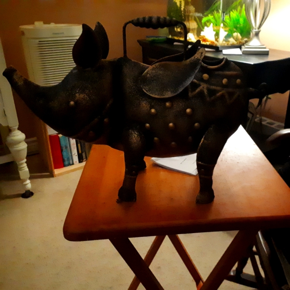 Armadillo with wings for watering plants. Made of steal.